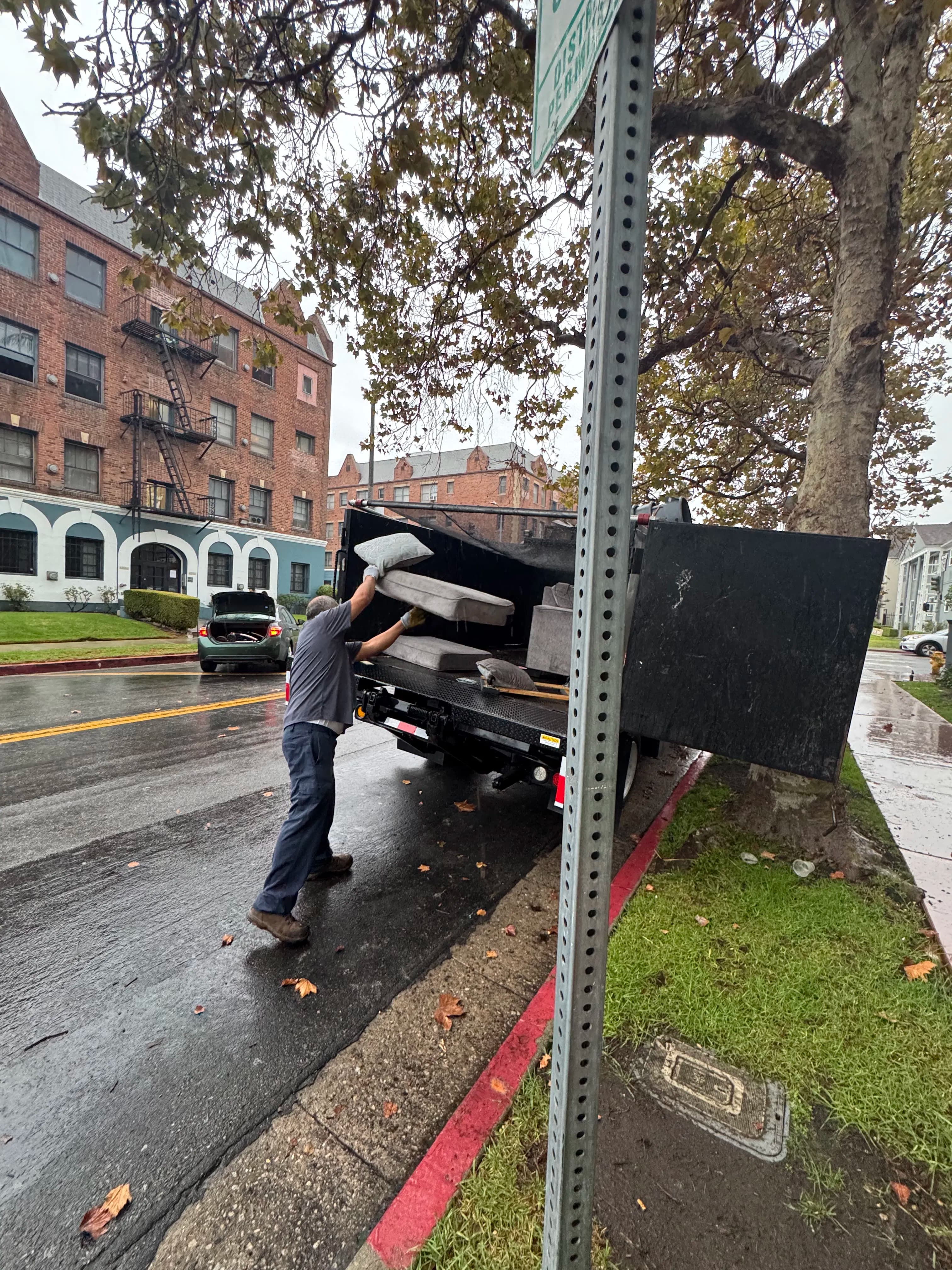 Project Couch Removal in the Rain - Los Angeles Gets It Done image