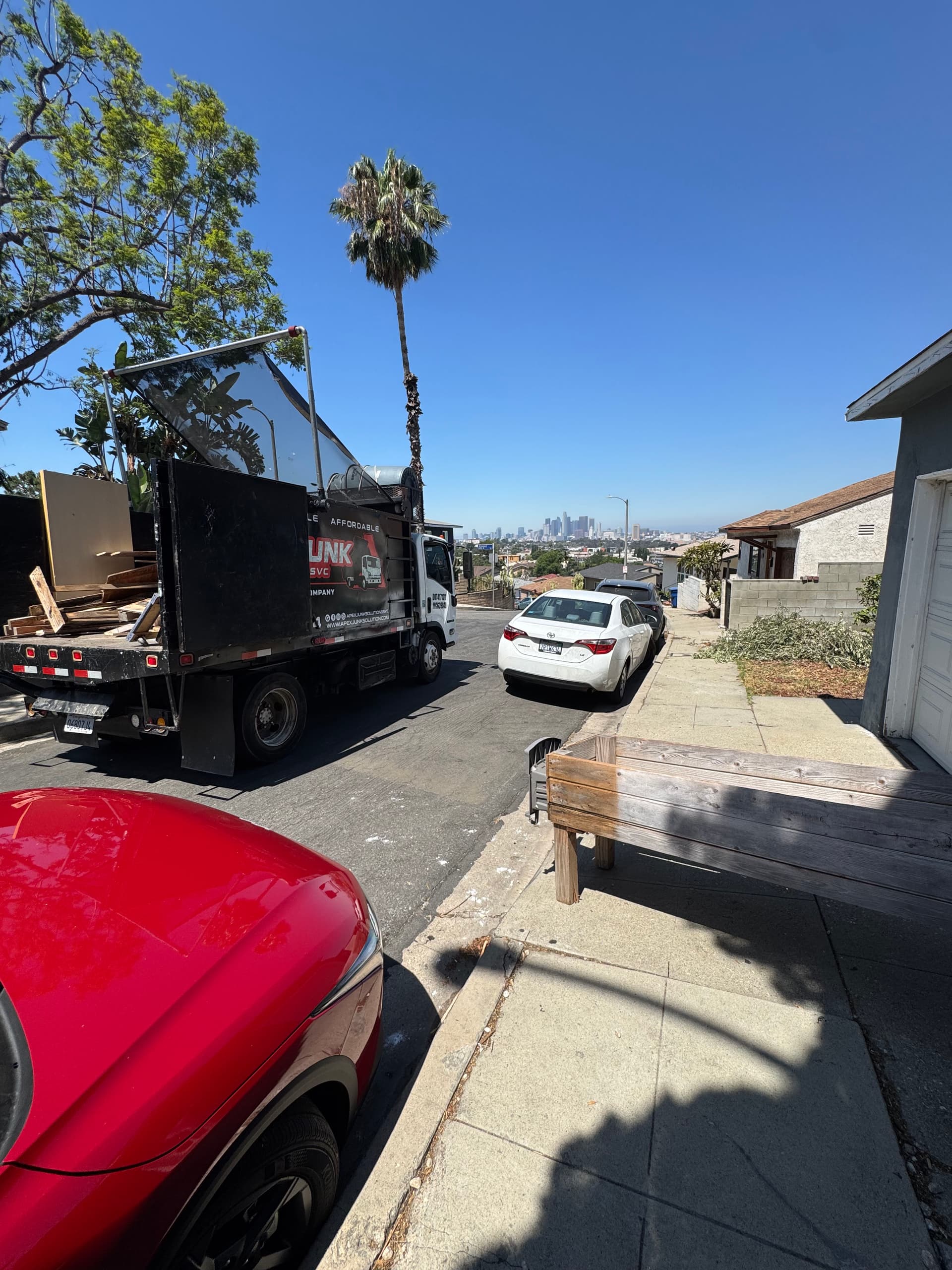 Heavy Wooden Planter Removal on a Boyle Heights Deck with DTLA Views image