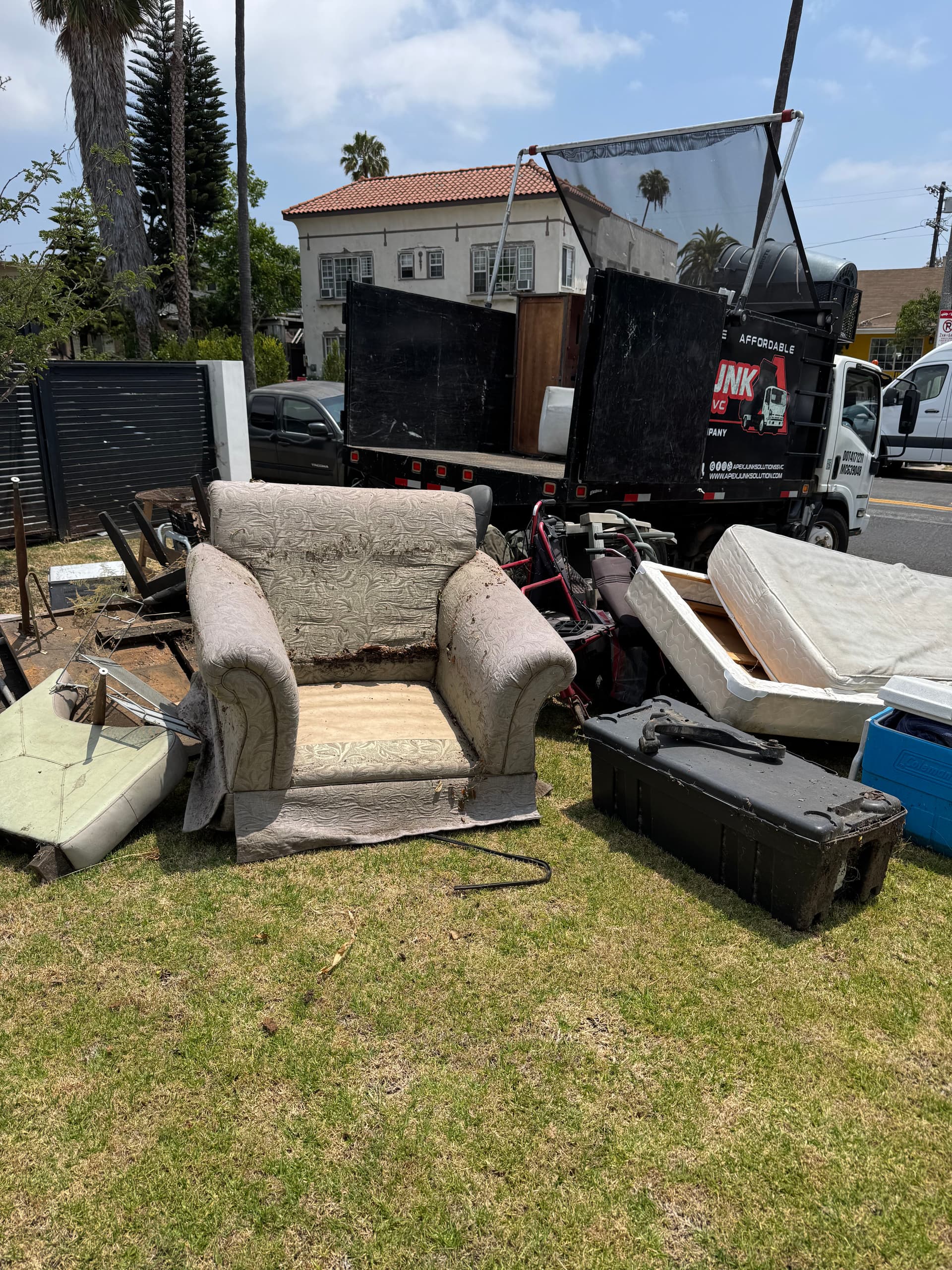 Backyard Cleanout in Mid City Los Angeles Hauling Heavy Rotten Wood and Bulk Junk image