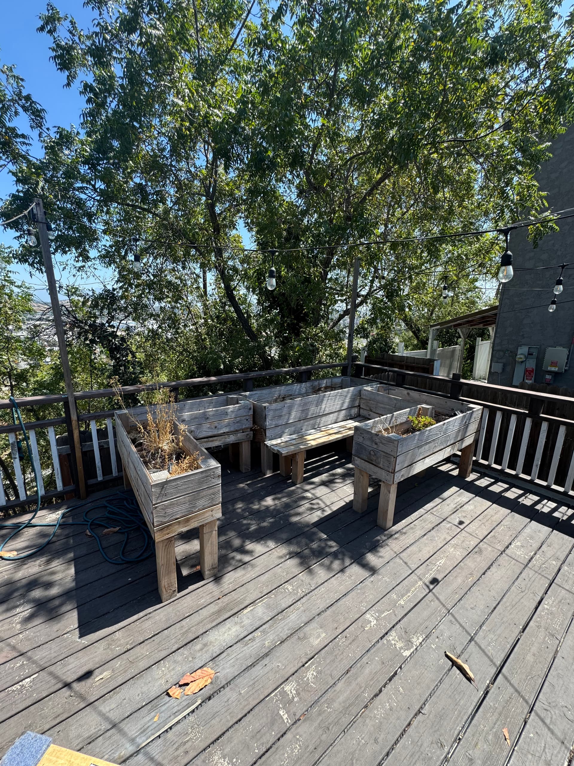 Gallery photos for Heavy Wooden Planter Removal on a Boyle Heights Deck with DTLA Views: Image #1